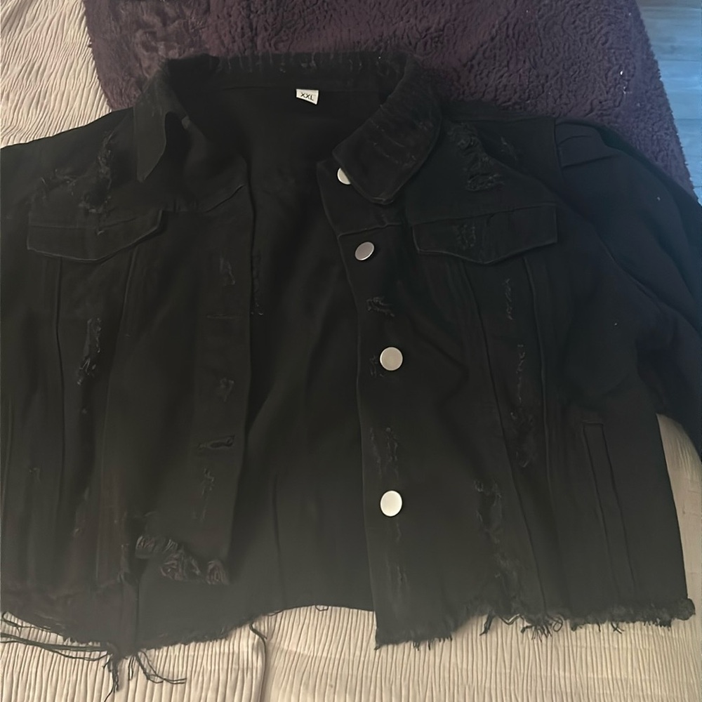 Black distressed Jean jacket says 2XL but will fit L or XL
Never worn, no tags.